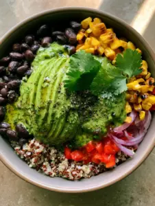Close-up of a Southwest quinoa salad featuring fluffy tri-color quinoa and fire-roasted corn kernels.