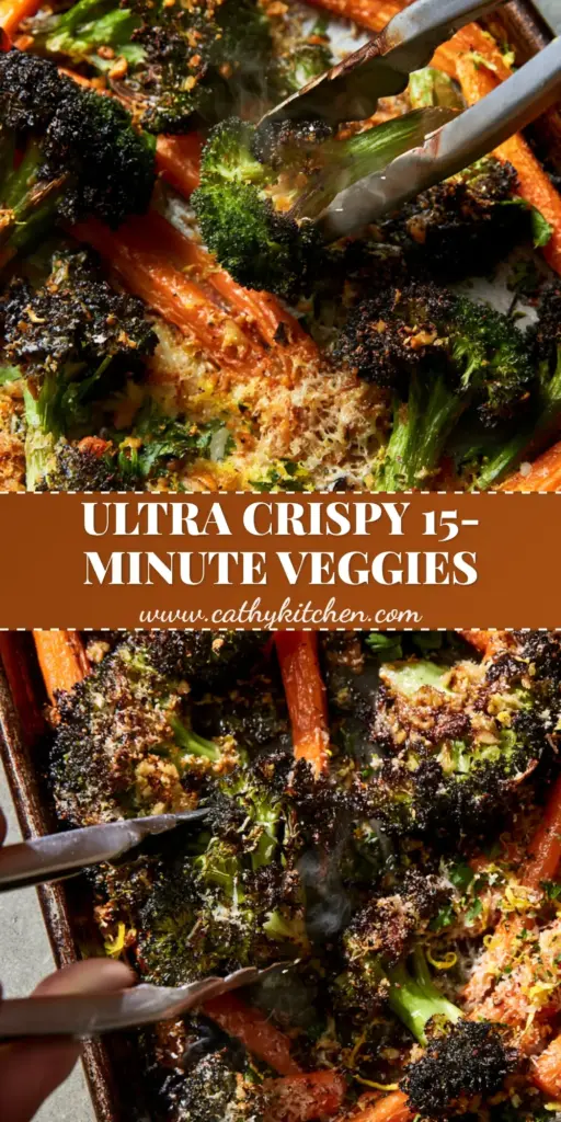 Roasted Broccoli and Carrots with Crispy Garlic Parmesan Crust 3 A close-up of roasted broccoli and carrots on a dark pan featuring charred edges, melted parmesan crust, and lemon zest. (roasted broccoli and carrots)